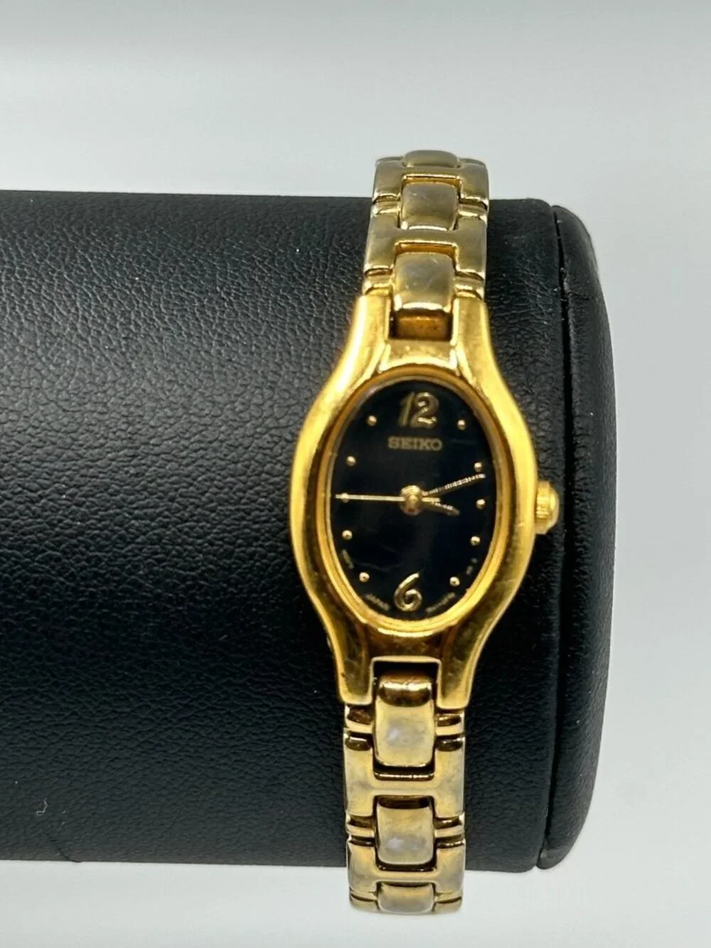 Seiko Watch Women Gold Tone Black Dial Oval Dial 1N01-0CS0 New Battery 6.75